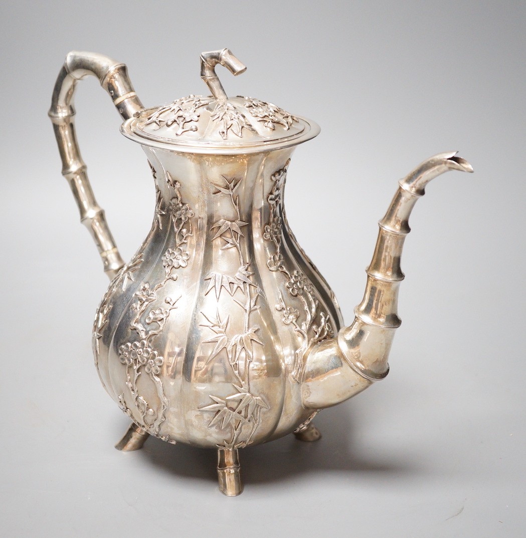 A late 19th/early 20th century Chinese Export white metal coffee pot by Hung Chong, height 20.3cm, gross weight 23.5oz.